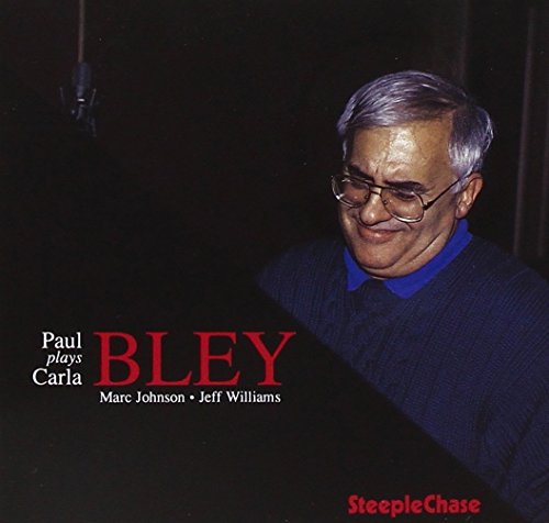 CD cover featuring portrait of jazz pianist Paul Bley with glasses.