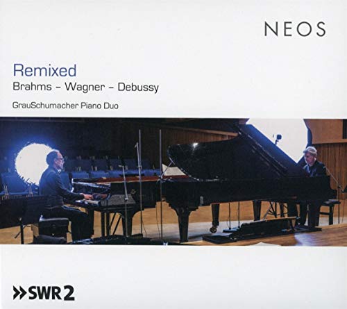 CD cover featuring two men playing grand pianos with microphones.