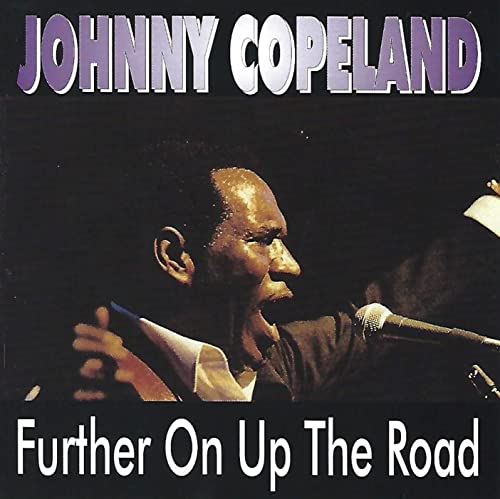 CD cover featuring blues musician Johnny Copeland singing into a microphone.