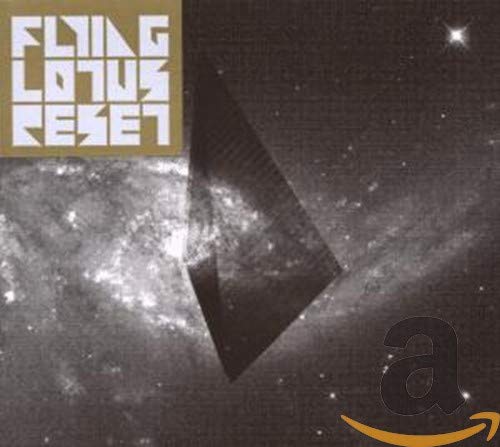 Album cover showing a dark pyramid shape against a starry galaxy background.