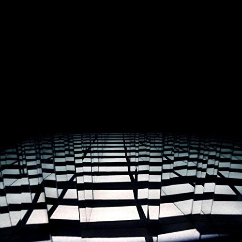 A vinyl record cover featuring a grid pattern with light and dark shadows.