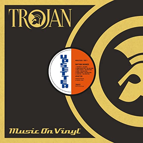 LP record with gold and black Trojan Records label, featuring "Upsetters" text.