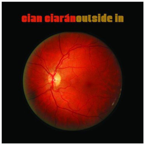 "Album cover with a red, circular image resembling a human eye on a black background."