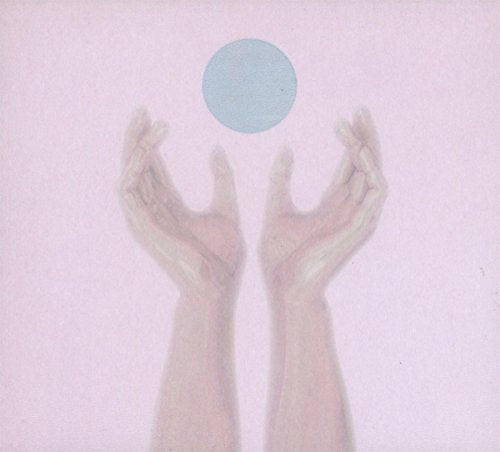 Pale hands reaching towards a light blue circle on pink background.