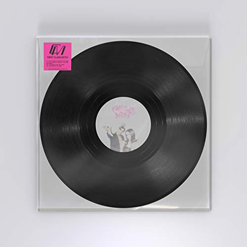 Black vinyl record in a clear sleeve with a pink sticker.