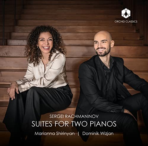 CD cover featuring two smiling pianists, Marianna Shirinyan and Dominik Wizjan.