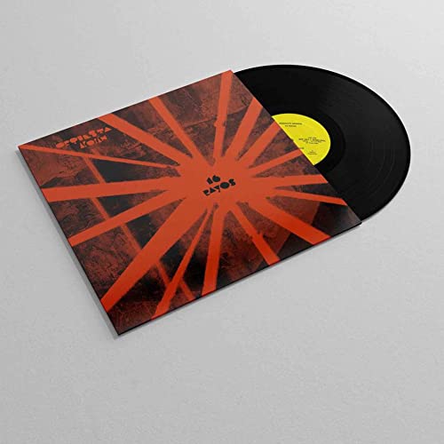 Vinyl record with a brown and red sunburst patterned cover.