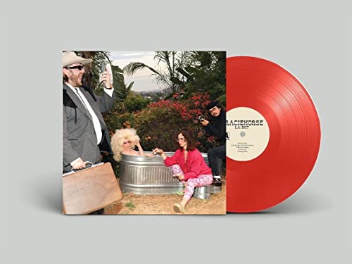 Red vinyl record with album cover showing people outdoors.
