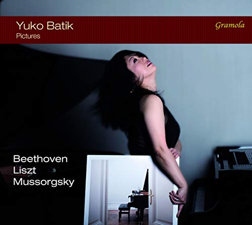 CD cover featuring pianist Yuko Batik and a doorway with a piano.