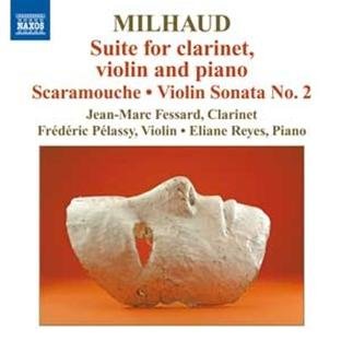 "CD cover featuring a white stone sculpture against a red background."