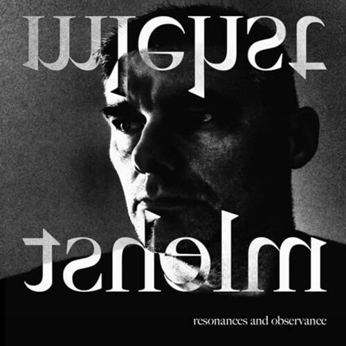 Black and white CD cover featuring a shadowed portrait and text.