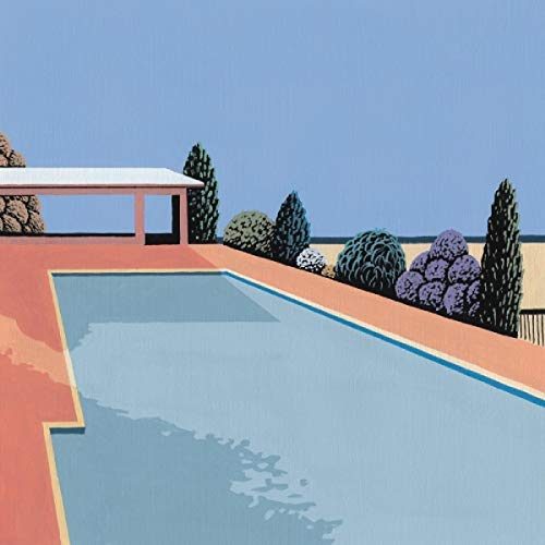 Outdoor swimming pool and pergola under a clear blue sky.