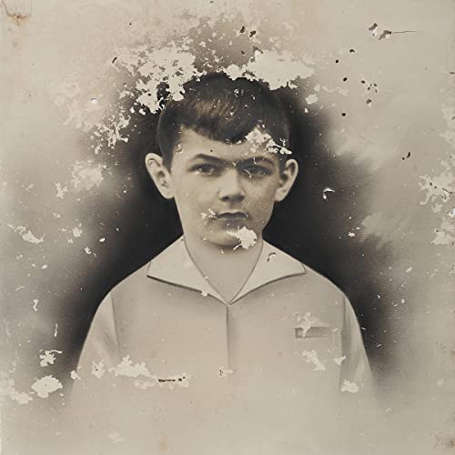 Vintage-style portrait of a young boy with a damaged, textured background.