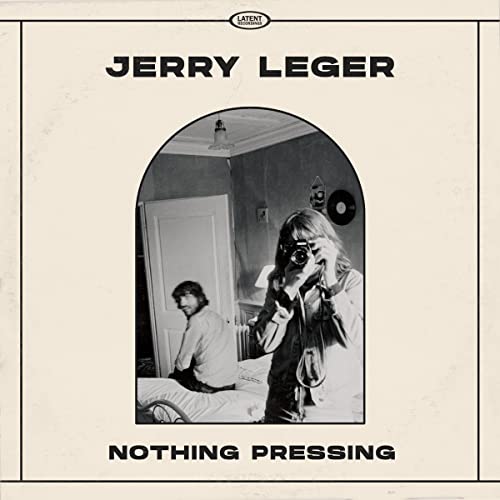 Vinyl album cover for Jerry Leger’s “Nothing Pressing” featuring two people.