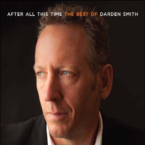 "Darden Smith's album cover featuring a man in a suit against a black background."
