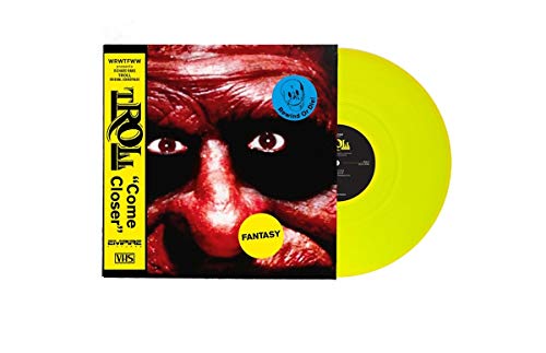 Troll soundtrack vinyl record with a red monster face cover and yellow disc.