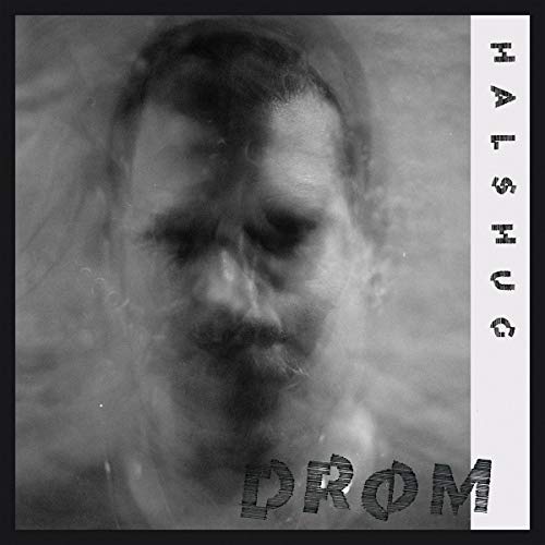 Black and white vinyl album cover featuring a blurred portrait of a man.