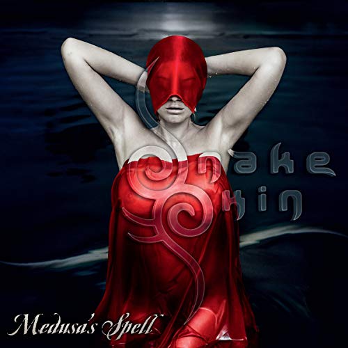Red-hooded figure with outstretched arms against a watery, dark background.