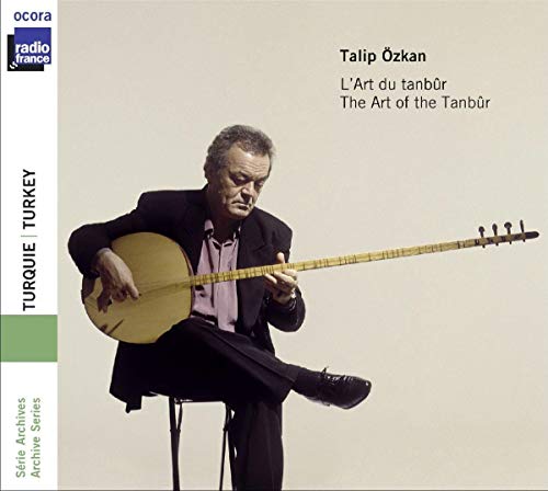 Man playing a long-necked tanbur instrument, CD cover art.