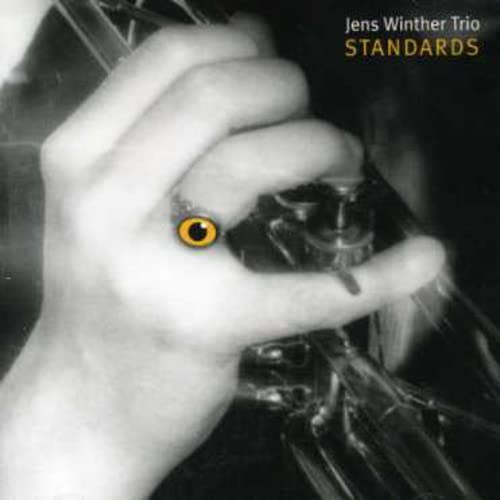 CD cover for Jens Winther Trio's "Standards" featuring a hand and eye.