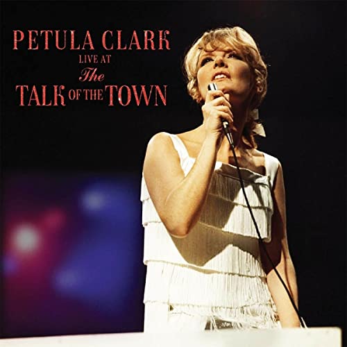 Petula Clark singing into a microphone on a stage, album cover.