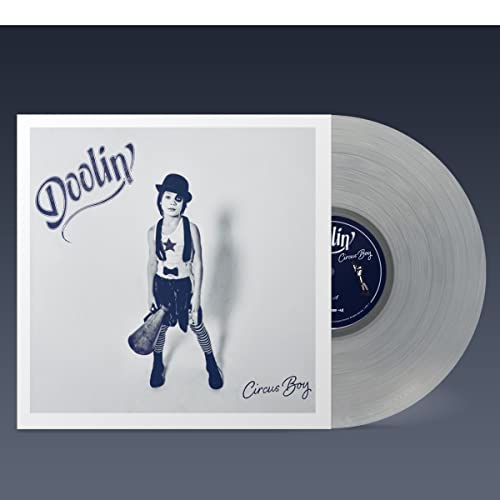 Vinyl record of Doolin’s “Circus Boy” with a boy in a bowler hat.