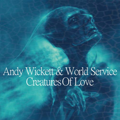 "Album cover with a blue-toned, abstract image and white text."