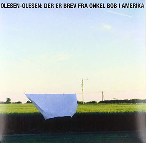 Vinyl record cover: green field, white sheet, power lines, blue sky.