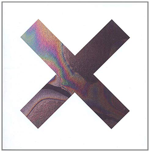 Iridescent and dark purple X shape on a white background.
