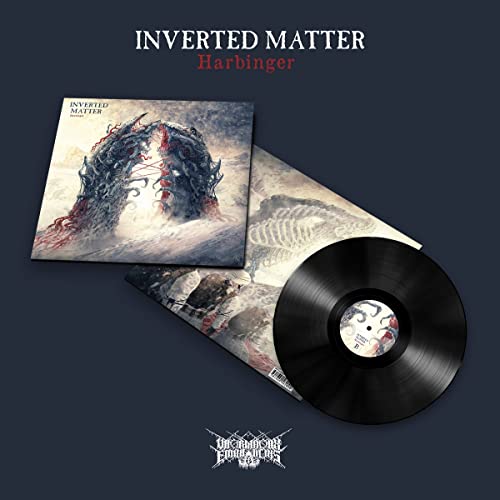 Vinyl record and cover art featuring a monstrous, red-tinged creature.