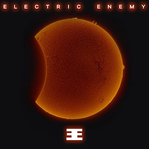CD cover for “Electric Enemy” featuring a solar eclipse image.