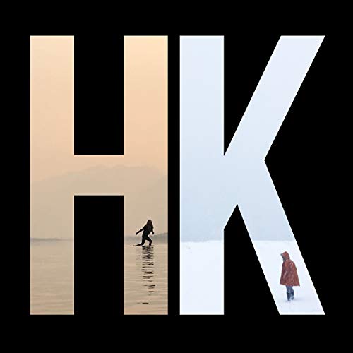 Large letters HK on a black background containing landscapes with two solitary figures.