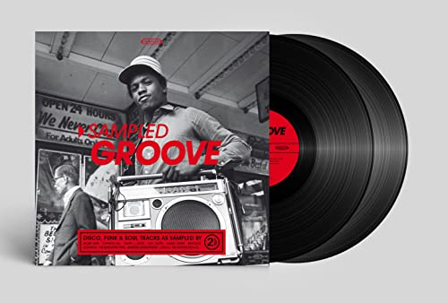 Vinyl record with cover art depicting a man with a boombox.
