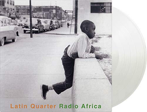 Black and white album cover with a boy looking over a wall, clear vinyl record.