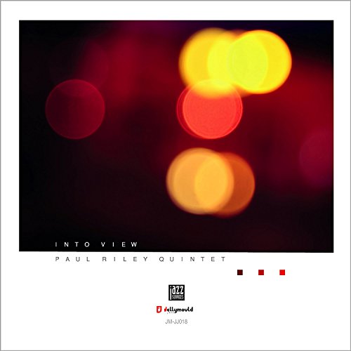 "Album cover with red and yellow bokeh lights, white text, and logos on a white background."