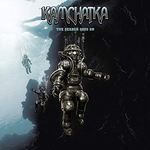 Vinyl album cover featuring divers in metal suits descending into dark underwater cavern.