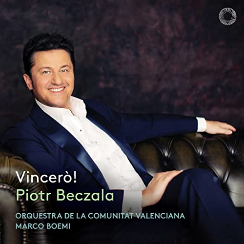 Piotr Beczala CD cover: tenor in suit reclining on leather couch.