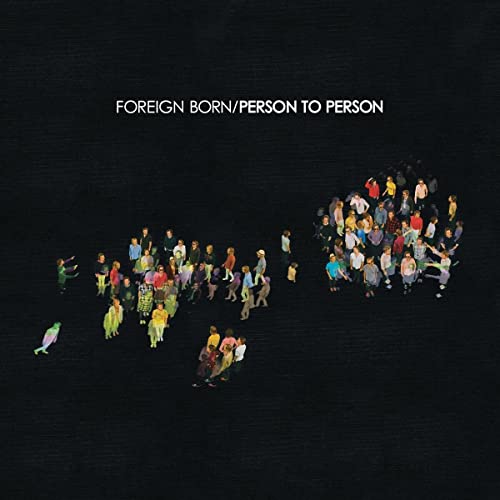 Album cover: miniature figures forming lines on a textured black background.