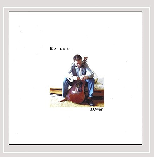 The image shows a man sitting on a couch, holding a guitar, with the title "Exiles" and artist "J. Owen" displayed. Alt text: Man sitting on couch with guitar on album cover.