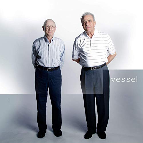 CD cover for twenty one pilots' "Vessel" featuring two older men.
