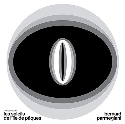 "Black and gray circular design with white center, artist and title text on white background."