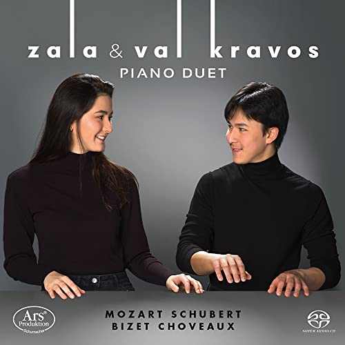 CD cover featuring two young pianists, Zala and Val Kravos, in black tops.