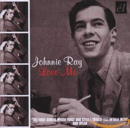 "CD cover featuring black and white photos of Johnnie Ray, smiling and holding a pen."