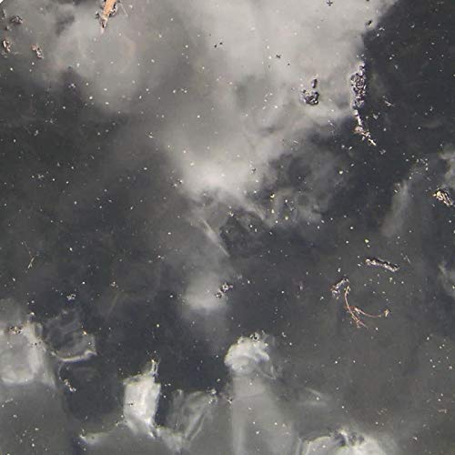 Dark, abstract album cover with swirling grey and black textures.