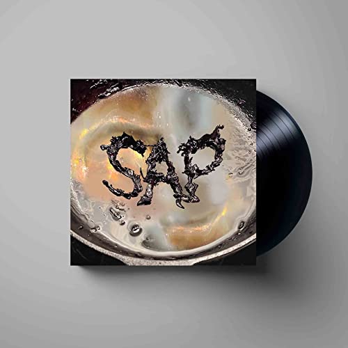 Okay Kaya’s “SAP” vinyl record with dark, textured lettering and a black disc.