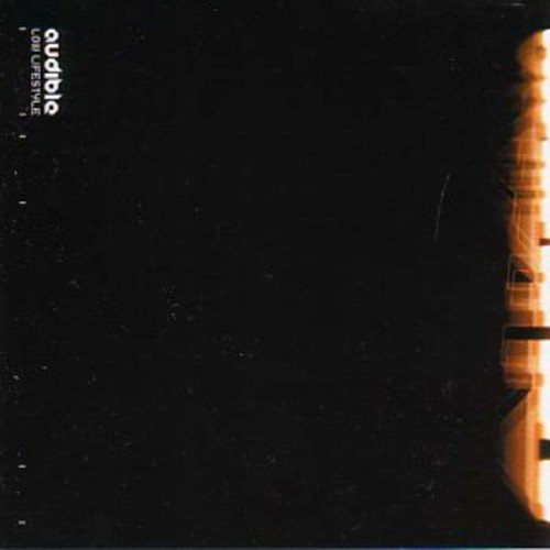 "Black album cover with 'audible' text and orange glow on the right edge."
