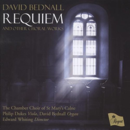 "CD cover with a church window and choir information."