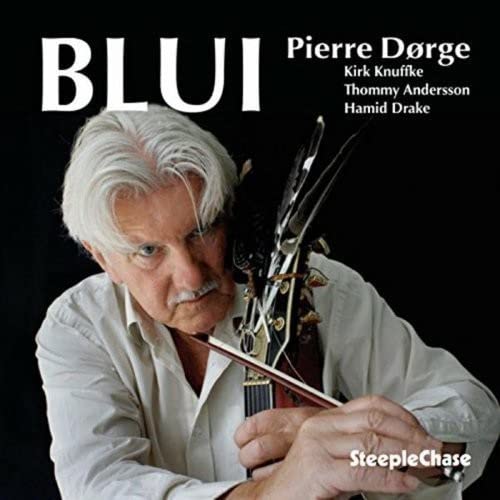 CD cover: Pierre Dørge with a bass guitar, dark background.