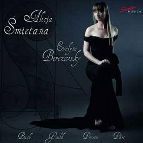 A woman in a black dress sits on a dark background with musical notes.