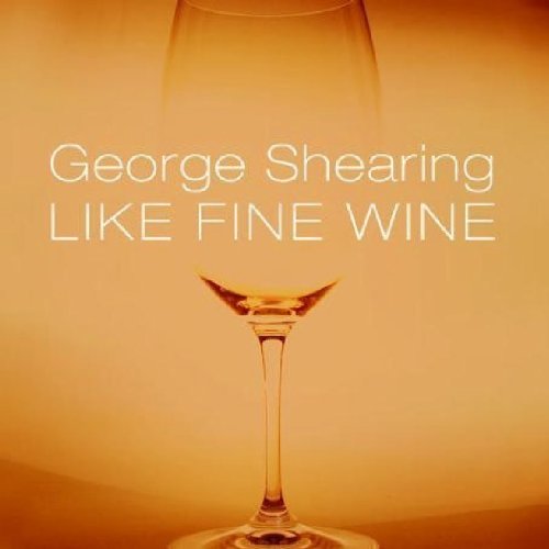 "Album cover featuring a wine glass on an orange background with white text."